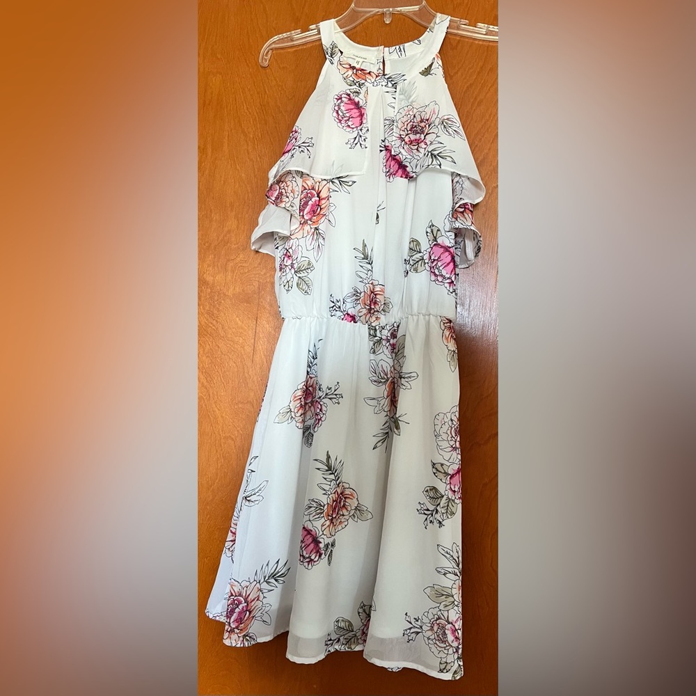 Maurices Dress Size: XS Color:  White with colored flowers.